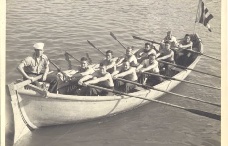 men rowing a boat