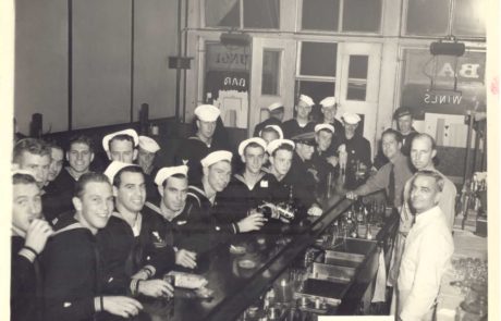 group of sailors in a bar